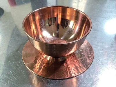 Copper spun bowl showing techniques