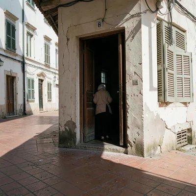 Siesta stillness, afternoon heat weight, An old woman glimpsed through a barely 