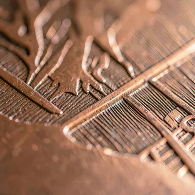 Macro study of a copper etching plate with fine acid-bitten lines