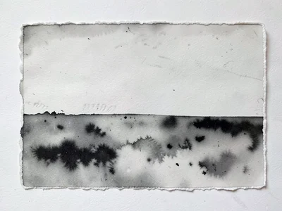 Monoprint edge where plate meets paper, sharp boundary between inked image and b