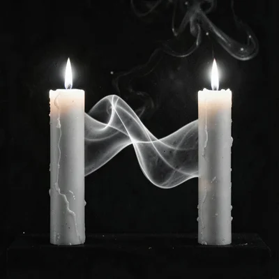 Two adjacent candles, heat plumes merging and separating between them