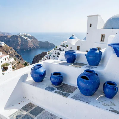 Sidi Bou Said cobalt-white, cliff-top absolute palette, Blue painted clay pots o