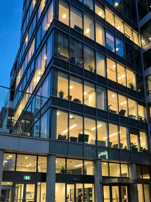 Office building windows lit