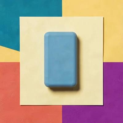 Catalog square of a kneaded eraser against a butter-yellow color block