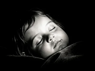 Sleeping child in soft light