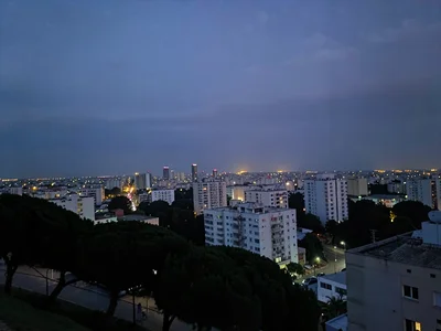 Distant city glow under twilight sky