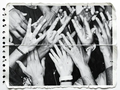 Overlapping photocopied hands, each from a different source, creating a crowd ef