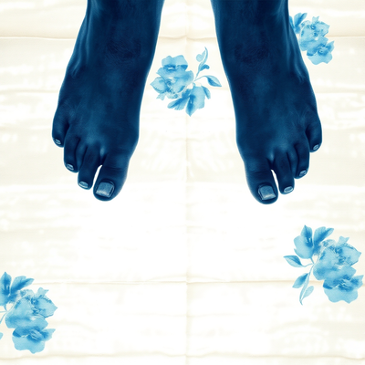 body-print cyanotype on fabric,. A pair of bare feet pressed onto cyanotype linen, keeping the intimate foot outlines an