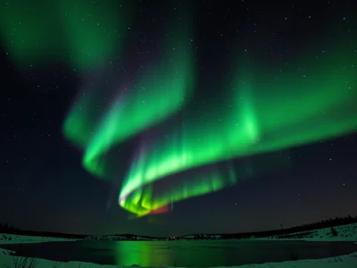 Aurora double arc, two parallel curtains at slightly different altitudes, green 