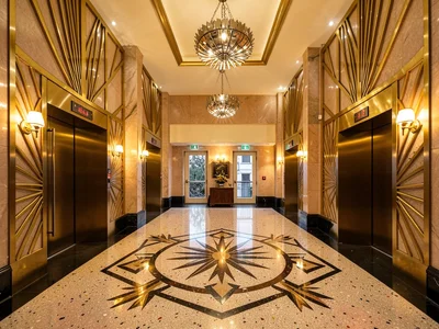 Twin Elevator Banks Grand Lobby
