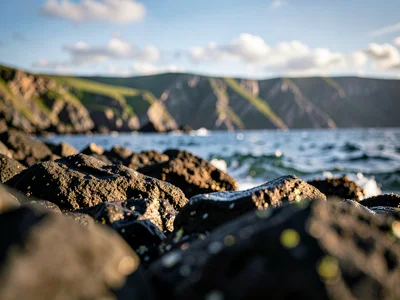 Coastal rocks foreground to distant cliffs
