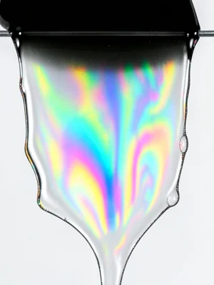 Soap film draining, thick at bottom (silver) thin at top (black), vertical gradi