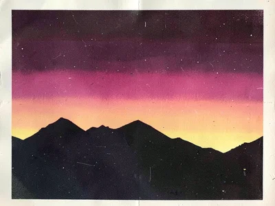 A mountain range silhouette at sunset with a flat gradient sky