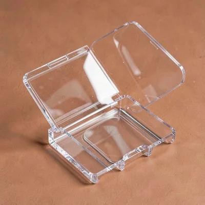 Catalog hero of an open acrylic starter set on a terracotta backdrop