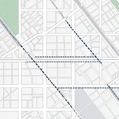 Map illustration of a downtown grid with three trip routes overlaid in dashed li