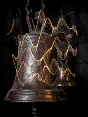 Church bells visualized as overlapping bronze and gold wave interference pattern
