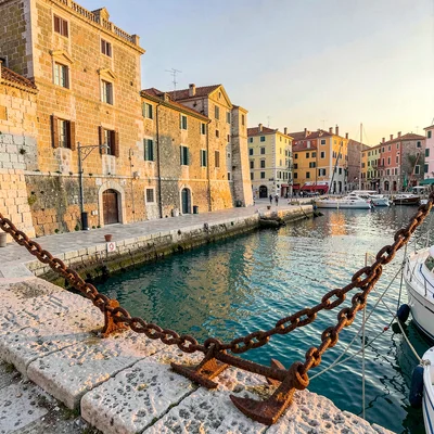 Adriatic limestone warmth, Dubrovnik honey stone, Anchor chain rusting on quaysi