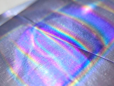 Thin film on anodized titanium, voltage-controlled oxide creating specific inter