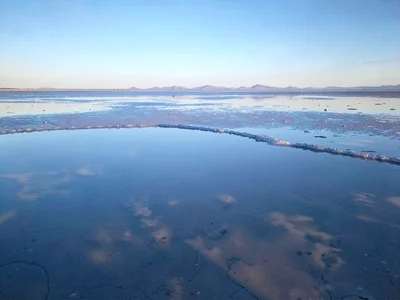 Perfect sky reflection on thin water layer
