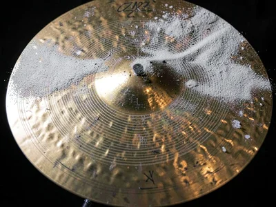 Cymbal surface showing nodal lines in fine powder at high frequency