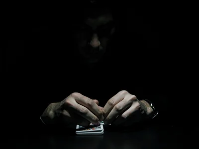 Hands shuffling cards