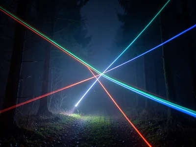 Flashlight beams crossing in a foggy forest, visible light cones, geometric inte