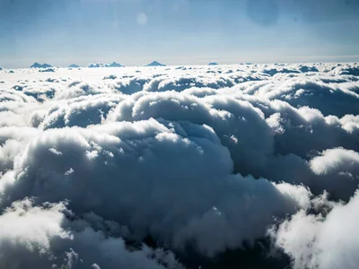 Cloud shadow falling on distant cloud creating depth layers