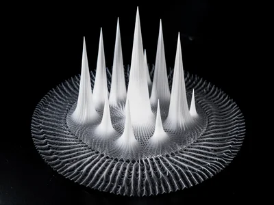 Ferrofluid forming tall spires in response to rhythmic pulse