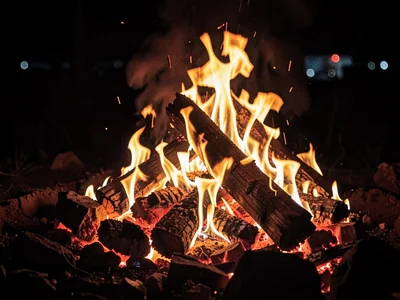 Fire at night with no other light