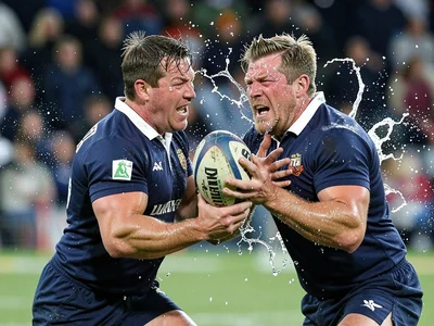 Two rugby players mid-collision, their faces distorted by impact, sweat and spit