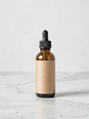 Amber dropper bottle hero on textured concrete