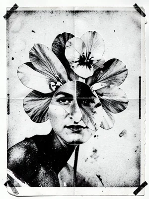 A photocopied flower arrangement with petals cut and rearranged into a face shap