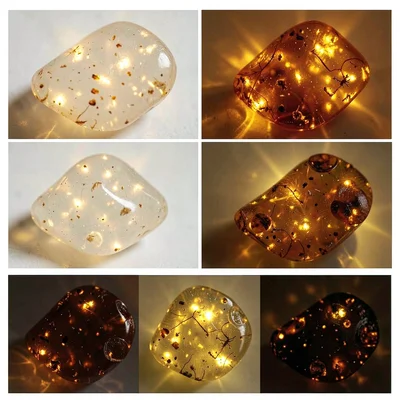 Baltic amber luminescence, backlit golden-brown, Amber specimens ranging from cl