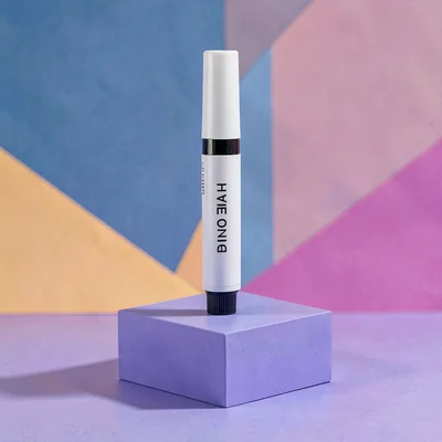 Catalog ad of a marker standing on a periwinkle block, hairline shadow
