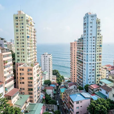Busan vertical density, hillside village stacking, pastel apartment towers stack