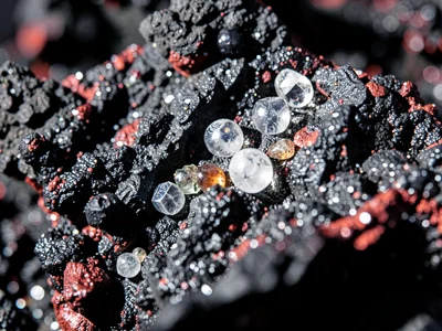 Volcanic glass with rare phenocryst inclusions