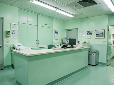 Nurse station with mint green counter, medical administration, care coordination