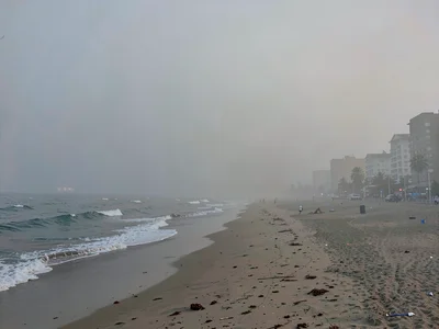 Urban beach in smog