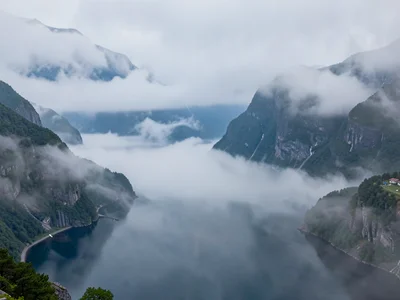 Fjord arms disappearing into mist in sequence