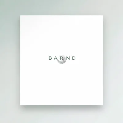 Brand card composition with airy white space and a small abstract sand-grain sym