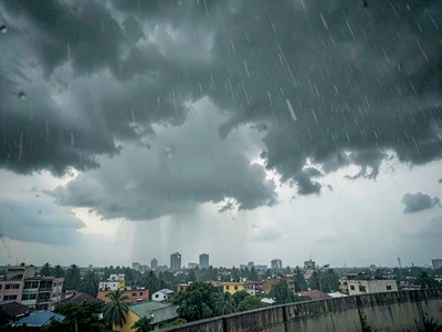 Monsoon wall approaching over city skyline