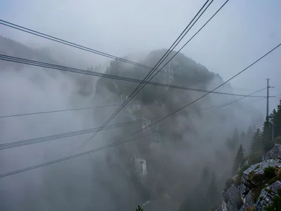 Power lines as geometric element across mist