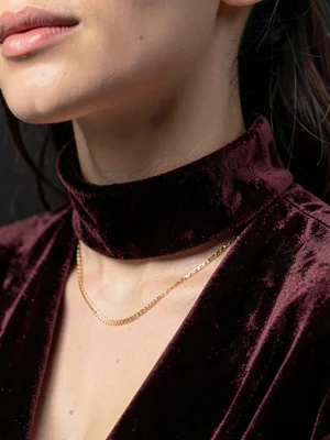 Velvet choker on neck, accessory intimacy, tactile fashion