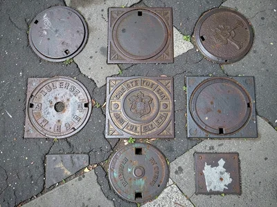 Cluster of Mixed Utility Covers on Corner