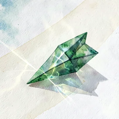 Tiny emerald lowpoly arrowhead resting on its side with sharp green planes refra