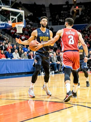 Basketball tip-off from floor level