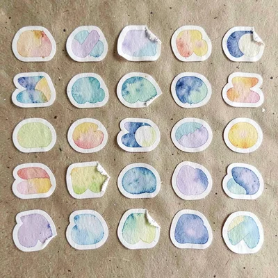 A sticker-sheet grid of twenty small abstract sticker shapes arranged in five ro