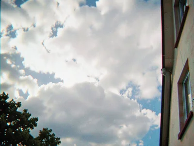 Building edge against clouds fringing
