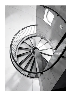 Spiral staircase from below — circular rail, triangular wedge steps