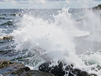 Spray frozen at fast shutter detail